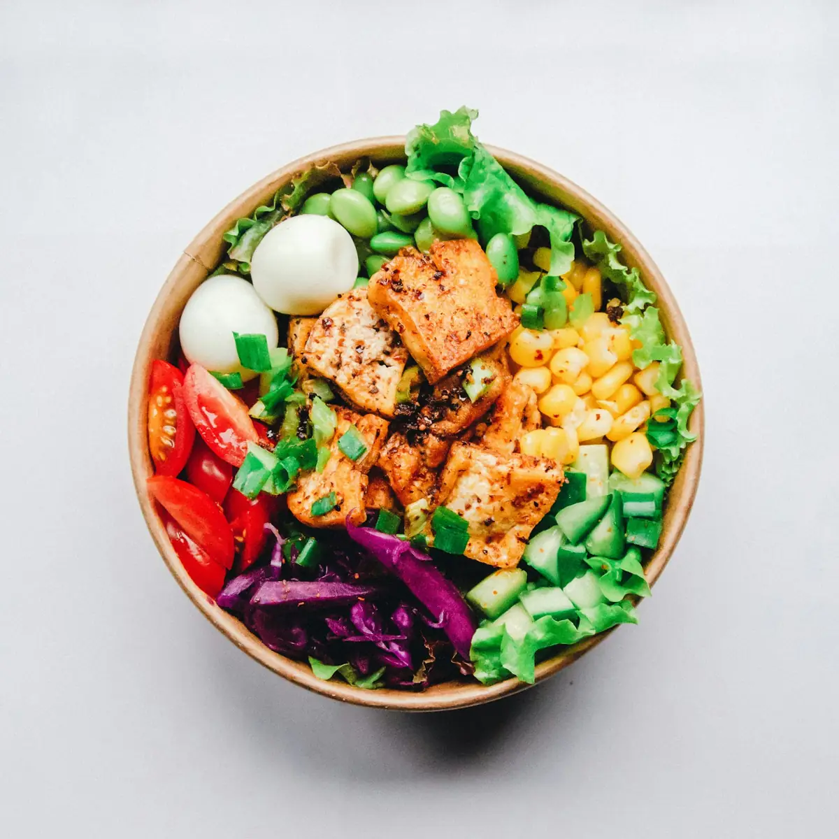 Bowl of grains, vegetables and greens