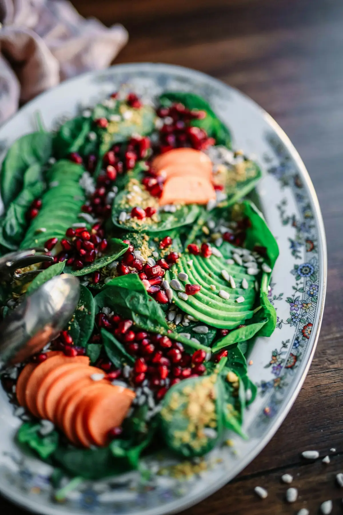 Salad with avocado and pomegranate seeds